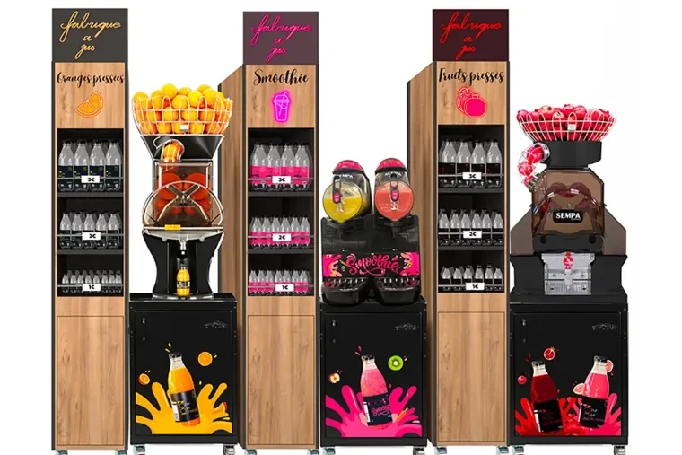 Configuration La Fabrique à Jus avec trois machines dédiées aux oranges, pommes et fruits pressés